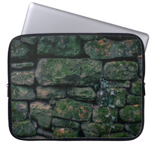Brown vines on stacked stone blocks laptop sleeve