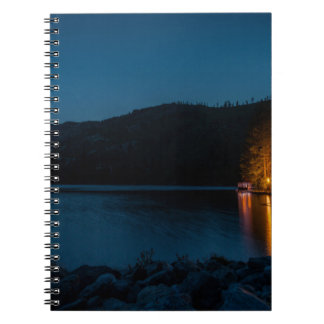 BROWN WOODEN DOCK ON BLUE LAKE DURING NIGHT TIME NOTEBOOK