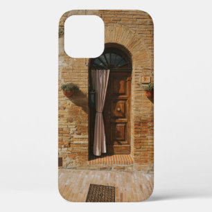 BROWN WOODEN DOOR ON BROWN BRICK WALL iPhone 12 CASE