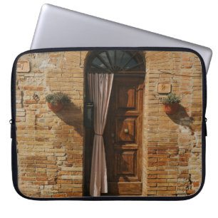 BROWN WOODEN DOOR ON BROWN BRICK WALL LAPTOP SLEEVE