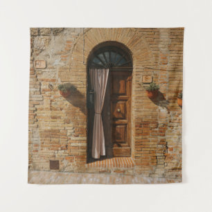 BROWN WOODEN DOOR ON BROWN BRICK WALL TAPESTRY