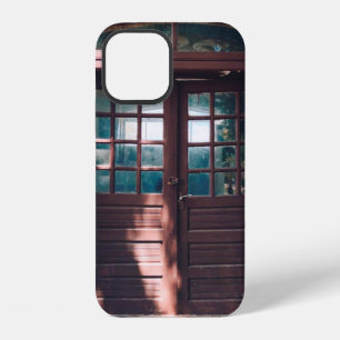 BROWN WOODEN WINDOW ON BLUE CONCRETE WALL iPhone 12 CASE