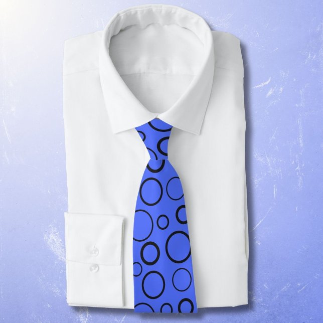 Bubbles and rings, black circles on blue tie (Creator Uploaded)