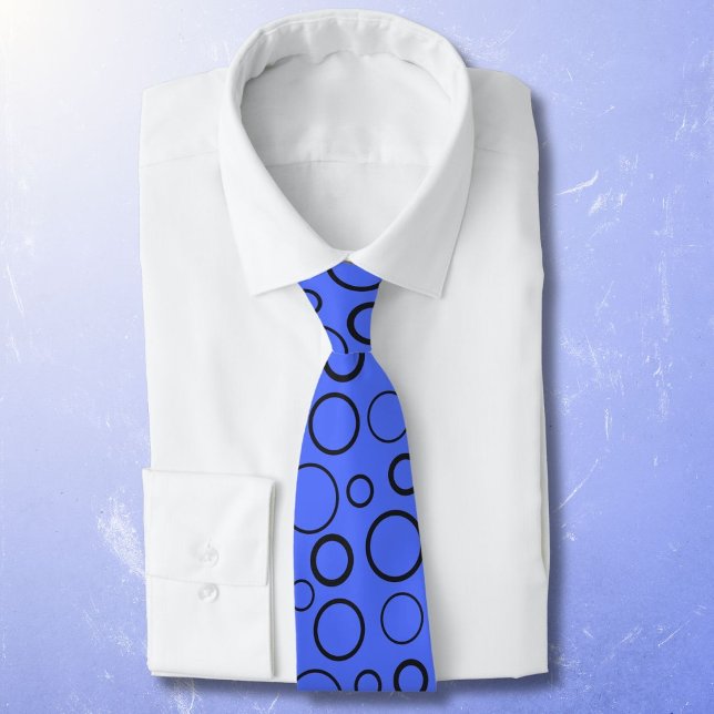 Bubbles and rings, black circles on blue tie (Creator Uploaded)