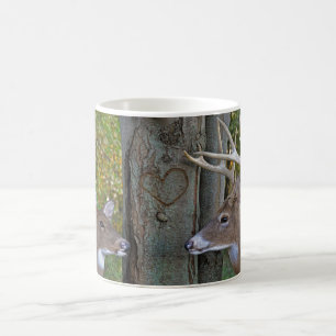buck and doe with hearts  in forest coffee mug