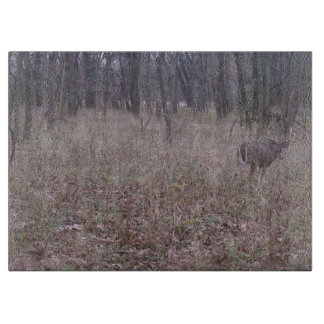 Buck in the woods cutting board