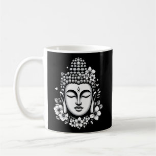 Buddha head adorned with flowers coffee mug