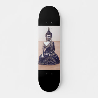 Buddha Metallic Statue on Wooden Floor Skateboard