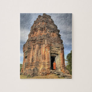 Buddhist monk standing in doorway of temple jigsaw puzzle