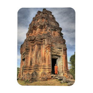Buddhist monk standing in doorway of temple magnet