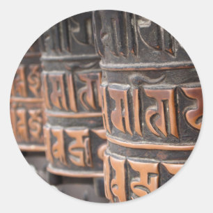 Buddhist prayer wheels round sticker