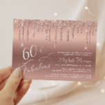 Budget 60th Birthday Glitter Rose Gold Invitation<br><div class="desc">Elegant, chic and budget-friendly 60th birthday party invitation featuring "60 & Fabulous" written in stylish white script against a rose gold background, with rose gold faux glitter dripping down. Personalise with her name and the party details. This budget semi-gloss paper is similar in weight to photo paper. A larger 5x7...</div>