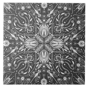 Bugs, off white on black ceramic tile