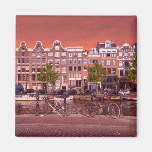 Buildings, canal, bikes in Amsterdam, Netherlands Magnet