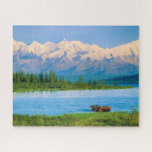 Bull moose in Wonder Lake Jigsaw Puzzle<br><div class="desc">Wonder Lake,  Bull moose feeds on vegetation,  Alaska mountains in the distance,  Denali National Park,  Alaska</div>