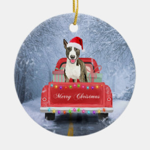 Bull Terrier Dog in Snow sitting in Christmas  Ceramic Ornament