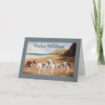 Bulldogs On The Beach Christmas Card<br><div class="desc">The Bulldog is gentle, friendly, and adoring, with a mischievous dose of stubbornness, the English Bulldog is incessantly loyal to its family. It usually gets along well with other animals, is particularly fond of children, and does best indoors. Highly spirited as a puppy, the English Bulldog grows up to be...</div>