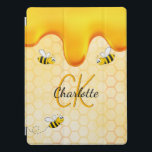 Bumble bees honeycomb honey dripping monogram iPad pro cover<br><div class="desc">Yellow,  white background with a bee honeycomb pattern and happy smiling bumble bees. Decorated with sweet,  golden honey dripping. Personalise and add your name and monogram initials,  golden and black letters.  The name is written with a hand lettered style script.</div>