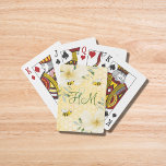 Bumble bees yellow honeycomb flowers monogram playing cards<br><div class="desc">Yellow,  white background with a honeycomb pattern. Decorated with light yellow,  cream coloured tropical florals flowers,  hibiscus and happy bumble bees. Template for your monogram,  your names first letters.  Perfect for your summer vacation and parties.</div>