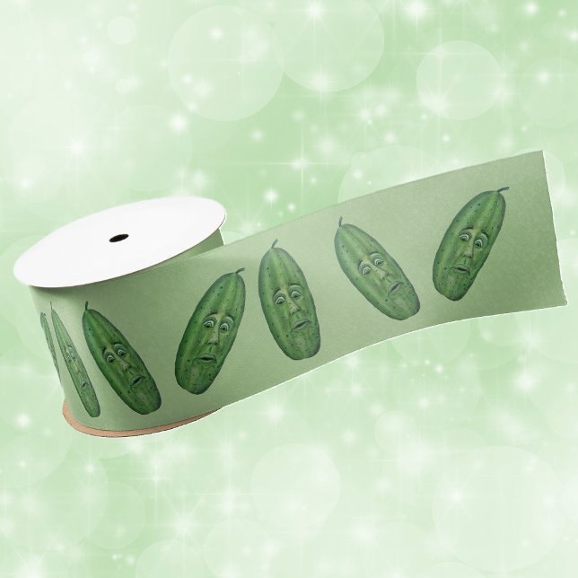 Bunch Funny faces on Green Pickles on light Green Satin Ribbon (bunch of green pickles with funny faces green eyes on light green gift wrap or craft ribbon.)