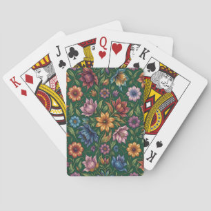 Bunch of colourful flowers on green playing cards