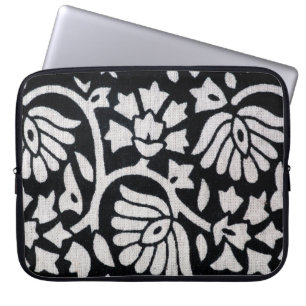 Bunches of plants and flowers abstract on a black laptop sleeve