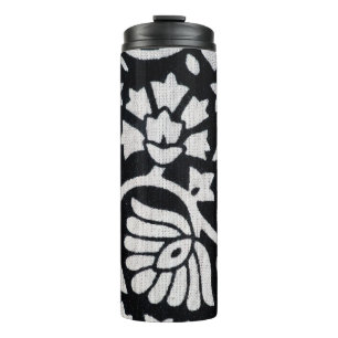 Bunches of plants and flowers abstract on a black  thermal tumbler
