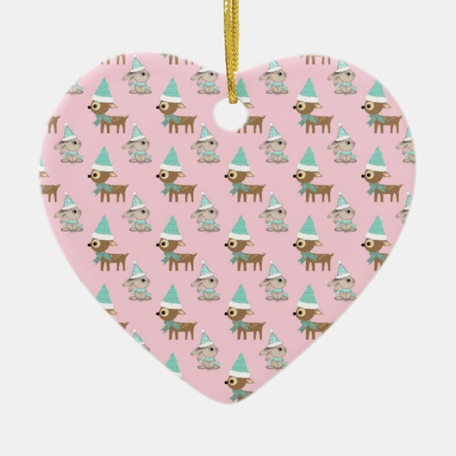 Bunnies and Reindeer over Pale Pink Holiday Art Ceramic Ornament (Front)