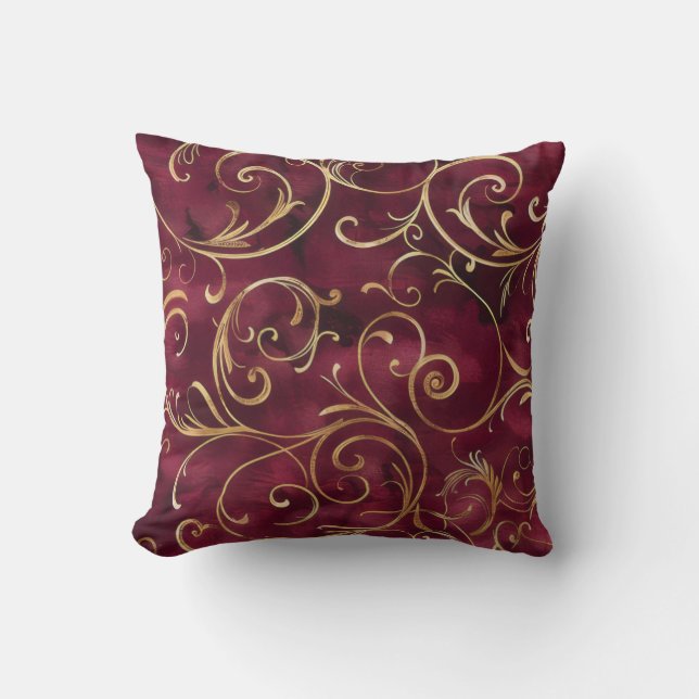 Burgundy and gold filigree print cushion (Front)