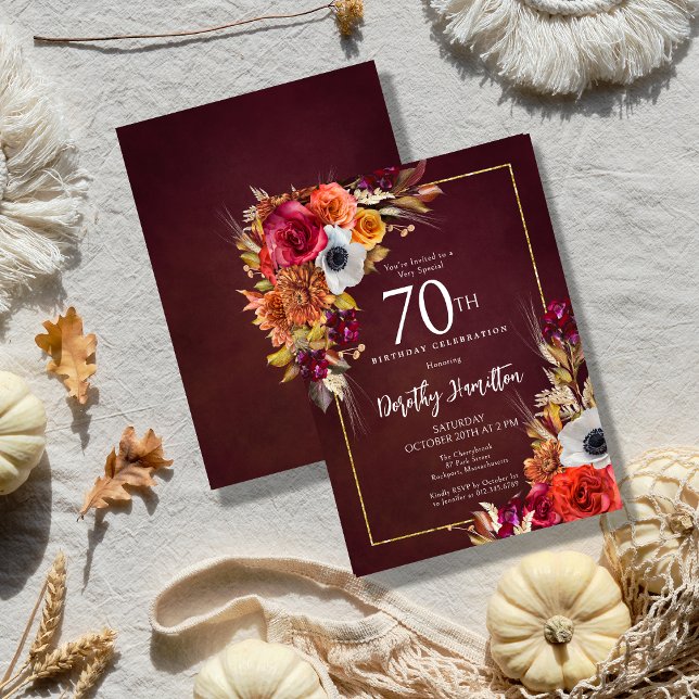 Burgundy Fall Flowers Elegant Script 70th Birthday Invitation (Elegant Fall Flowers Pop Against a Burgundy Background on an Autumn Floral 70th Birthday Invitation)