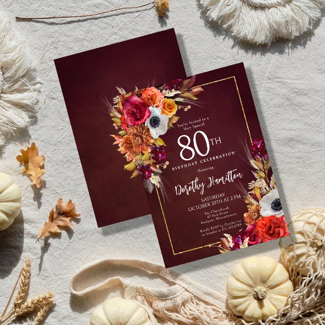 Burgundy Fall Flowers Elegant Script 80th Birthday Invitation (Elegant Fall Flowers on a Burgundy Background Create a Dramatic Autumn birthday invitation)