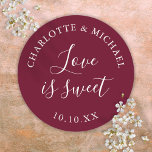 Burgundy Love Is Sweet Wedding Favor  Classic Round Sticker<br><div class="desc">Burgundy wedding favor love is sweet classic round sticker. Designed by Thisisnotme©</div>