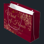 Burgundy Maroon & Gold Lace Maid of Honour Wedding Large Gift Bag<br><div class="desc">This beautiful gift bag is designed as a wedding gift or favour bag for the Maid of Honour. It features a beautiful burgundy, maroon, or wine red coloured background with golden faux foil lace curls and swirls in the corners. The gold script lettering reads "Maid of Honour" with a place...</div>