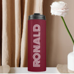 Burgundy Modern Typography Personalised Name Thermal Tumbler<br><div class="desc">Keep hot beverages hot and cold beverages cold in this trendy,  insulated thermal tumbler that is a burgundy colour along with name printed in white,  modern  typography. Edit your thermal tumbler and replace name with desired name. Perfect for a birthday gift,  wedding groomsman gift,  etc.</div>