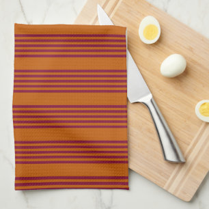 Burgundy red and burnt orange five stripe pattern. tea towel