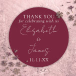 Burgundy Red Elegant Script Wedding Thank You Classic Round Sticker<br><div class="desc">This burgundy red minimalist elegant script wedding thank you sticker can be personalised with your information in chic typography. Designed by Thisisnotme©</div>