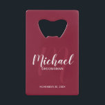 Burgundy Red Script Personalised Groomsmen<br><div class="desc">Add a personal touch to your wedding with personalised groomsmen credit card bottle opener. This bottle opener features personalised groomsmen's name in white modern script font style and monogram in light red modern script font style as background with title and wedding date in white modern sans serif font style on...</div>