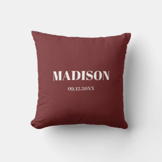 Burgundy throw pillow