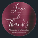 Burgundy Wedding Love & Thanks Classic Round Sticker<br><div class="desc">Burgundy Purple - Cranberry Marsala and White Typography Script Faux Faux Metal Metallic Elegant Love and Thanks - Thank You Favour Sticker that can be used as an Envelope Seal. This sticker can be customised to include your name and wedding date. This sticker is part of a matching autumn or...</div>