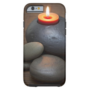 Burning candle flame with rocks in tranquil tough iPhone 6 case