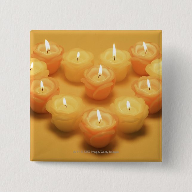 Burning candles arranged in a heart shape 15 cm square badge (Front)