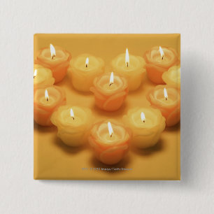 Burning candles arranged in a heart shape 15 cm square badge