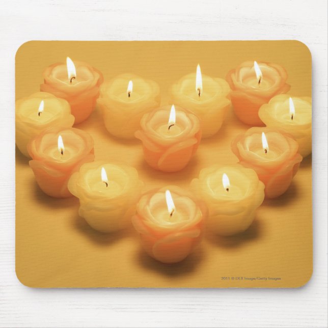 Burning candles arranged in a heart shape mouse pad (Front)