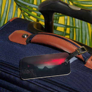 Burning clouds, fog and mountains luggage tag