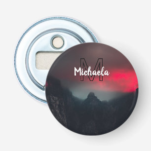 Burning clouds, fog and mountains monogram in sky bottle opener
