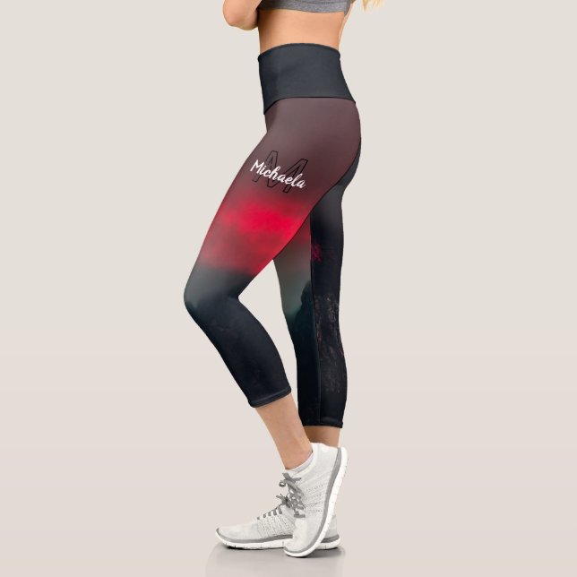 Burning clouds, fog and mountains monogram in sky capri leggings (Left)