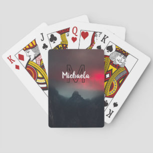 Burning clouds, fog and mountains monogram in sky playing cards