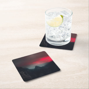 Burning clouds, fog and mountains square paper coaster