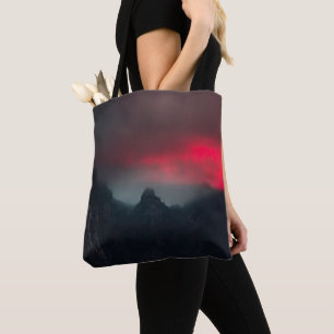 Burning clouds, fog and mountains tote bag