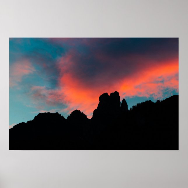 Burning clouds over the mountains poster (Front)